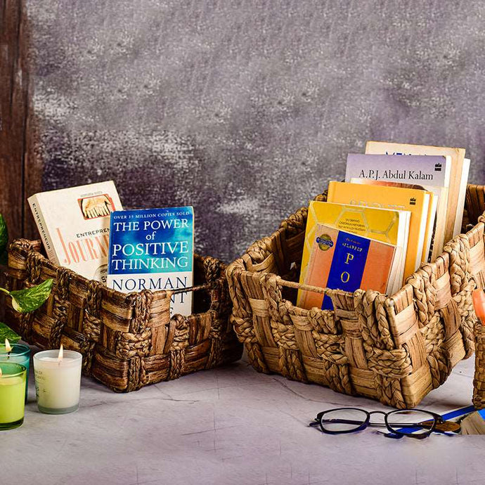 An open wicker basket made of natural fiber and iron, perfect for adding style and storage to any room